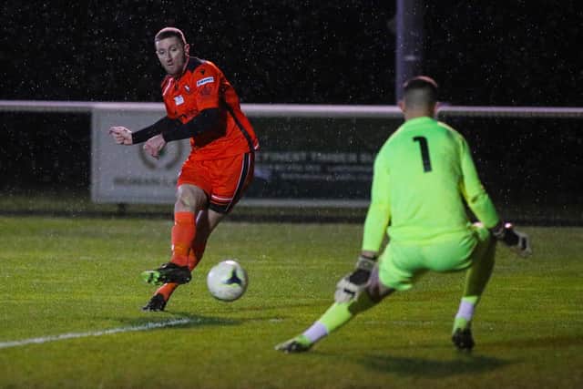 Lee Wort keeps his cool to fire AFC Portchester ahead against rivals Fareham Town last night. Picture: Stuart Martin (220421-7042)