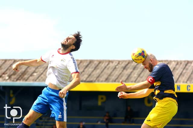 Striker Matt Paterson, left, in action for Gosport during the friendly with Lymington at Privett Park. Pic: Tom Phillips