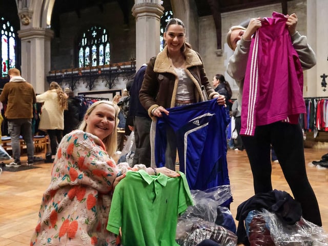 Natalie Evans (left) with her daughter and a family friend at Worth the Weight Vintage Kilo Sale, St Mary's Church, Fratton. Picture: Chris Moorhouse (010225-47)