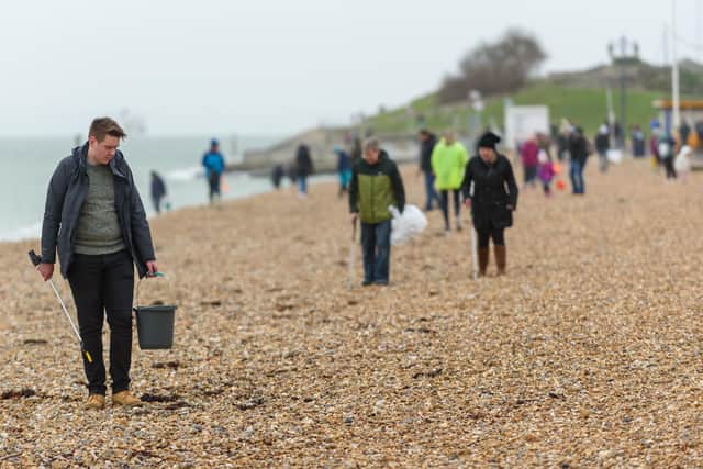 Southsea Beach Clean on Southsea beach near to the Rock Gardens - Beach cleaners setting off in their search for litter. Picture: Vernon Nash (070320-009)