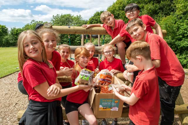 Children from Highbury Primary, Portsmouth pictured unboxing their Warburtons Farm in a Box, an initiative in partnership with The Country Trust to help provide additional food education to UK schools.