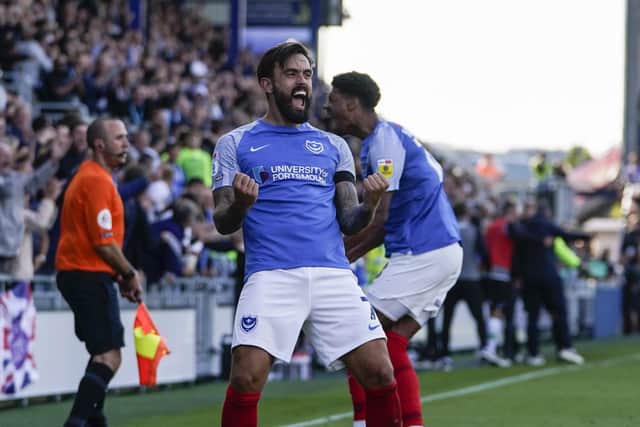 Marlon Pack celebrates Pompey's last-gasp equaliser against Plymouth Picture: Jason Brown