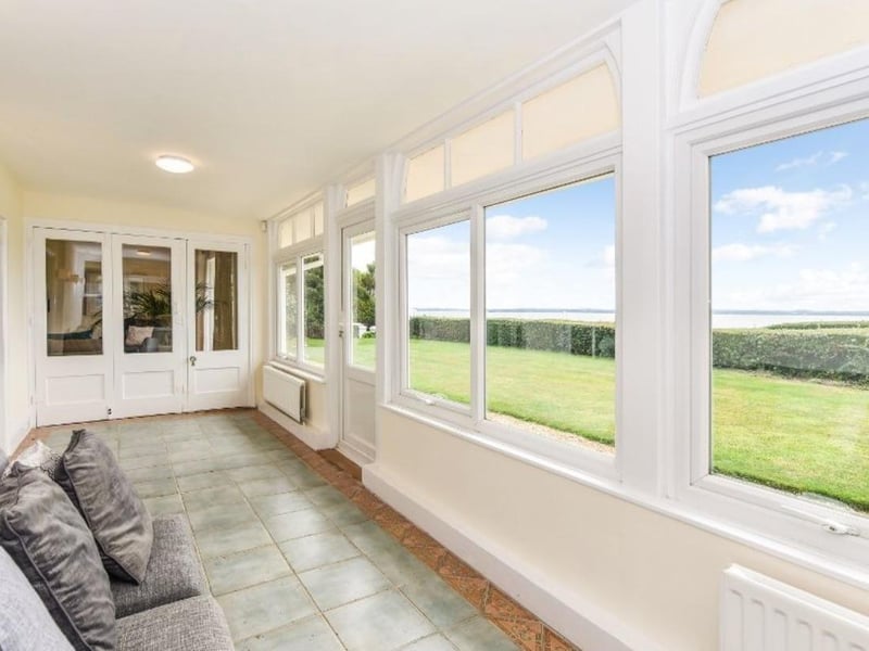 This property comes with six bedrooms, four bathrooms and five reception rooms. 

This home also comes with a heated pool, a gym and a large decked area. 

This home is on the market for offers over £3,000,000. 
This house is on the market with Jeffries & Dibbens Estate Agents. 

The listing says: "Comprising of approximately 7160 square feet, this impressive family home is situated on Hill Head Seafront and boasts panoramic views across the Solent to the Isle of Wight." 

The listing says: "The current owners have extensively renovated and extended the property, adding a heated swimming pool with deck, a fully equipped, sea-facing gym and a sleek office with vaulted ceilings."

This property is near public transport links including Fareham train station and Gosport Ferry Terminal. 
There are also local schools close by including Crofton Hammond Junior School and Crofton Hammond Infant School.