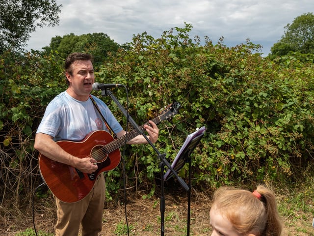 Busker Dom Reynolds performing at the Party in the Warren. Picture: Mike Cooter (080723)
