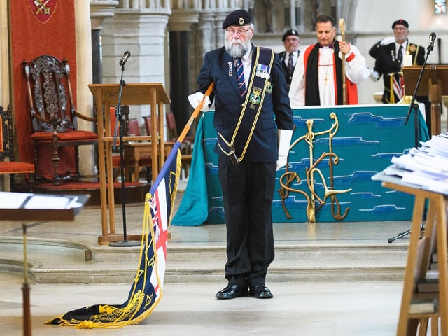 Pictured is: The Standards being lowered during the national anthem. Picture: Keith Woodland (190621-501)