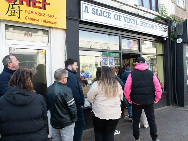 Record collectors waiting to go into A Slice of Vinyl in Gosport on Record Store Day.