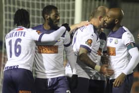 Hawks celebrate Roarie Deacon's winner in the FA Trophy third round win against Braintree