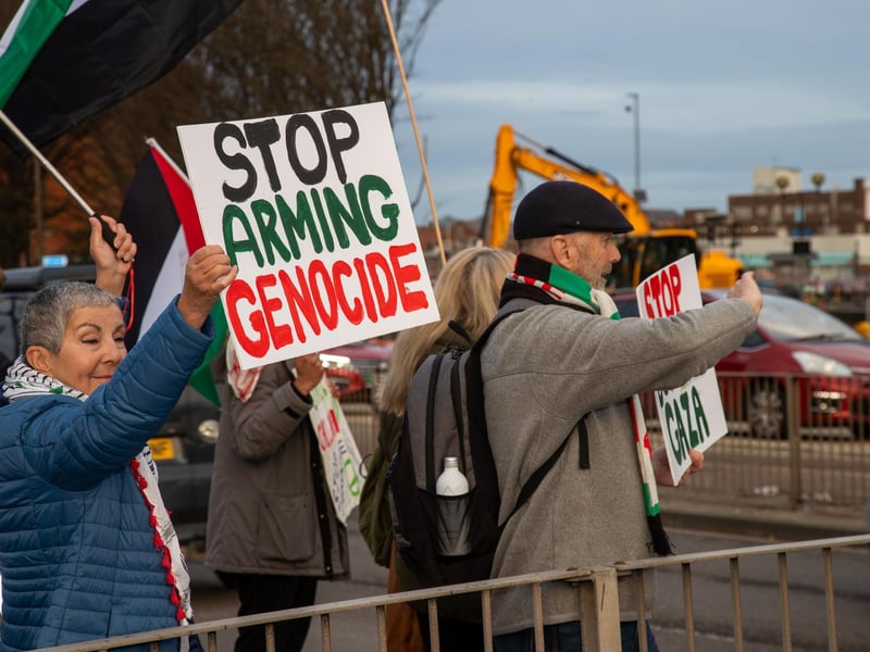 Demonstrators protested outside Unicorn Gate
Photos by Alex Shute