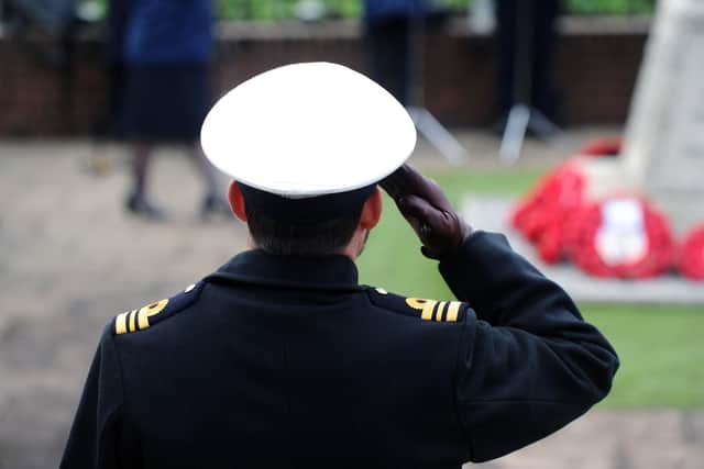 The Remembrance service in the memorial gardens in Marine Parade East, Lee-on-the-Solent
Picture: Sarah Standing (131122-2686)