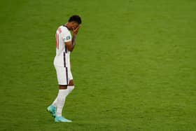 England's forward Marcus Rashford reacts after he fails to score in the penalty shootout during the Euro 2020 final against Italy on Sunday Picture: John Sibley/AFP via Getty Images