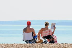Relaxing on Southsea BeachPicture: Sarah Standing (300724-2722)