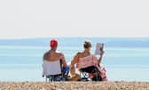 Relaxing on Southsea BeachPicture: Sarah Standing (300724-2722)