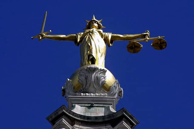 The Scales of Justice on top of the Old Bailey in London