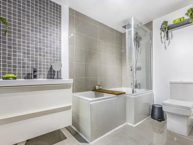 The listing says: "Boasting two reception rooms, two bedrooms, a large kitchen and bathroom and a rear garden, this property is an ideal first home or property to downsize to."