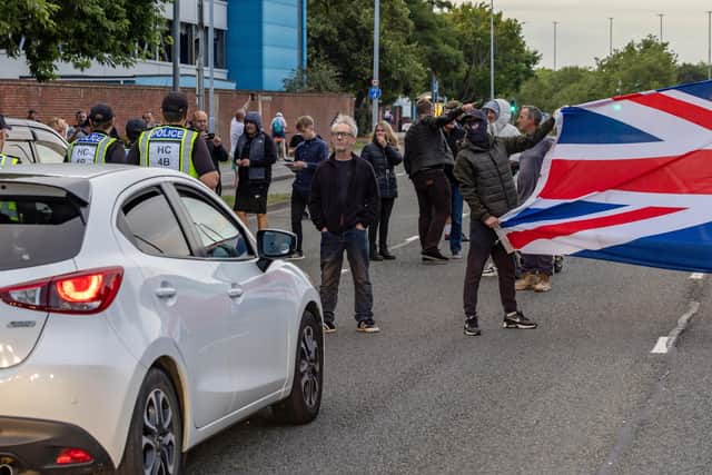 The M275 is brought to a standstill by Anti-immigration protesters. Picture: Mike Cooter (070824)
