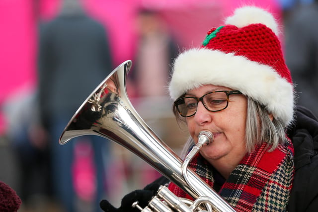 Player in Denmead Brass. Waterlooville Christmas market 
Picture: Chris Moorhouse
