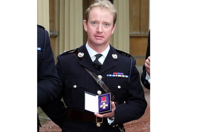 File photo dated 10/10/07 of the then Royal Marine Lt Col Matthew Holmes after receiving his Distinguished Service Order for services in Afghanistan, at Buckingham Palace. The former head of the Royal Marines Major General Matthew Holmes died as a result of hanging, a hearing in Winchester to open the inquest into his death has heard. Issue date: Tuesday October 12, 2021.