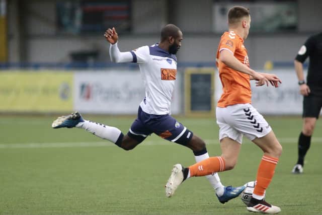 Bedsente Gomis lines up a shot during Hawks' FA Trophy win against Braintree. Pic: Kieron Louloudis.