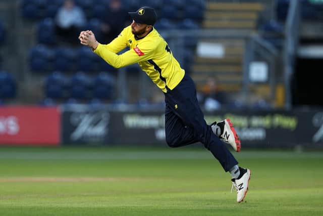 Hampshire skipper James Vince dives to catch Chris Cooke. Photo by Ryan Hiscott/Getty Images.