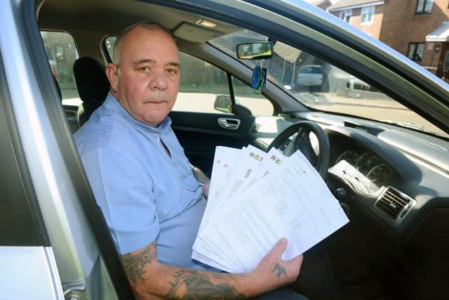 Gary Jeffery (56) from Paulsgrove, has received parking charge notices from the NCP car park in Crasswell Street in Portsmouth, despite paying for a car parking ticket back in July 2020. 

Picture: Sarah Standing (230221-3681)