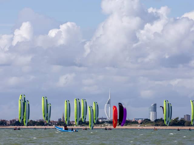 The Formula Kite European Championships start in Portsmouth, Southsea on Thursday 21st September 2023Pictured: Competitors on the fith wave of the race going past Spinnaker TowerPicture: Habibur Rahman