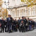 Pictured: Veterans marching to the service at the Remembrance Sunday event in Guildhall Square, portsmouth 14/11/21 Picrture By: Andy Hornby