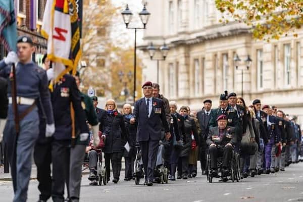Pictured: Veterans marching to the service at the Remembrance Sunday event in Guildhall Square, portsmouth 14/11/21 Picrture By: Andy Hornby