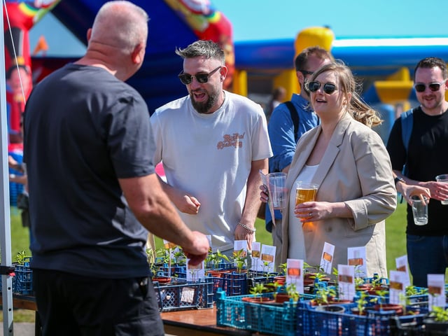 Ben and Kirsty Pilcher buy chilli plants from the Portsmouth Chilli and Gin Festival.