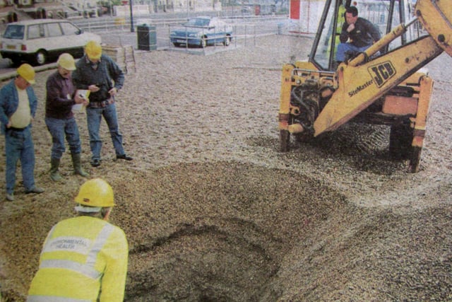 A hole dug in Southsea Beach, April 25th 1995.