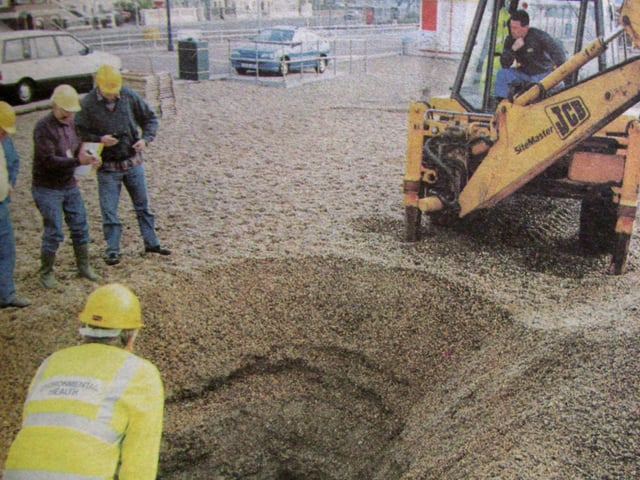 A hole dug in Southsea Beach, April 25th 1995.