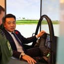 Alan Mak MP talks to an F-35 pilot after experiencing the cockpit demonstrator