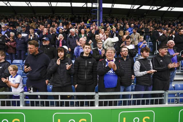 Portsmouth fans during the EFL Sky Bet League 1 match between Portsmouth and Wycombe Wanderers at Fratton Park, Portsmouth, England on 7 May 2023.