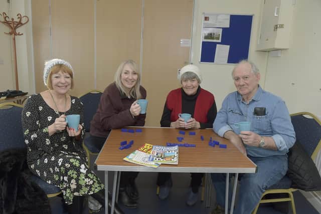 The Hayling Island Community Centre is hosting a ten week project that is offering families the opportunity to meet up and enjoy one free meal a week. The scheme will start in January and is set to help people experiencing the cost of living crisis. Pictured is: (second left) Iona Harkness, centre manager, with (l-r) volunteers Lyn Saunders, Jean and Tony Jevon.Picture: Sarah Standing (161222-7635)