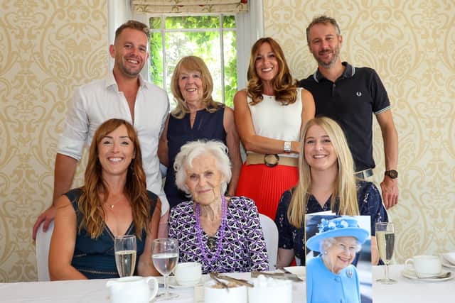 Edna Blott celebrated her 100th Birthday with all her family on Saturday afternoon at the Brookfield Hotel in Havant.Pictured - Edna Blott with her daughter, Grand Children and their partners. Photos By Alex Shute
