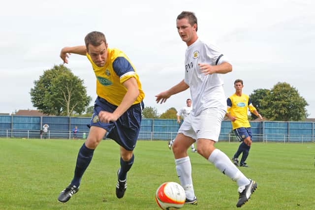 Gosport Borough's Lee Molyneaux, left, in action against Tiverton in 2011. Picture: Sarah Standing