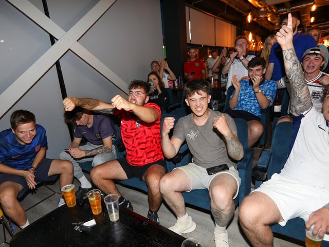 Celebrations at full-time. Fans watch Netherlands v England, UEFA Euros 2024 semi-final played in Dortmund, at Village Hotel, Lakeshore Drive, CoshamPicture: Chris  Moorhouse (100724-097)