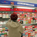 Shopping for Christmas cards.  Photo by Tim Boyle/Getty Images