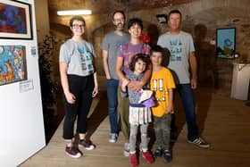 The Wilder Art Exhibition, hosted by Hampshire & Isle of Wight Wildlife Trust, is taking place on October 9 and 10 in the Round Tower, Southsea.Pictured is (L-R) Marianne Lotter-Jones, artist Southsea Zoo real name Leila Kemp and her family and Andy Ames.Picture: Sam Stephenson