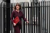 Britain's Chancellor of the Exchequer, Rachel Reeves, leaves 11, Downing Street to deliver her Spring Statement to Parliament on March 26, 2025.