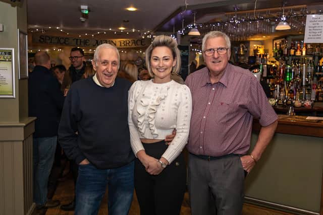 Trevor's older brother Peter Jenkins, 77, with daughter Amanda Jenkins, 38, and brother Malcolm Jenkins, 72, at The Jolly Sailor. Picture: Mike Cooter (210122)