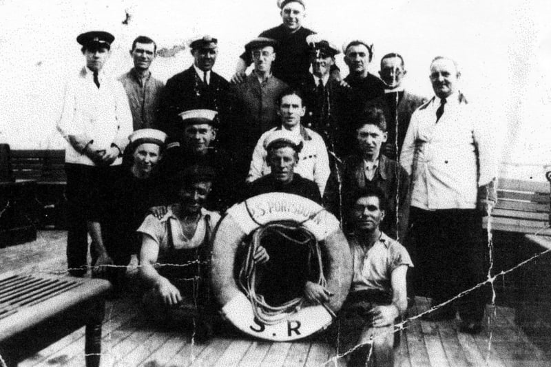 The crew of the paddle steamer Portsdown with Arthur Bundy standing fourth from the right in the white cap.