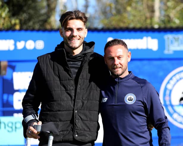 Club captain Charlie Oakwell who broke his leg in two places a fortnight ago at Baffins Milton Rovers FC with his manager Danny Thompson, right. The gate receipts from Saturday's game with Sherborne were donated to him to support his family
Picture: Chris Moorhouse (jpns 141023-191)