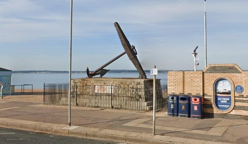 This memorial consists of an anchor from HMS Victory on a stone plinth with a wooden cross piece. The ship itself can be seen in the historic dockyard.