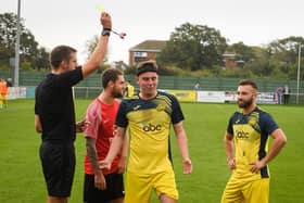 Moneyfields defender Tom Cain is booked in the recent win at Fareham, earning him a one-game suspension. Picture: Keith Woodland