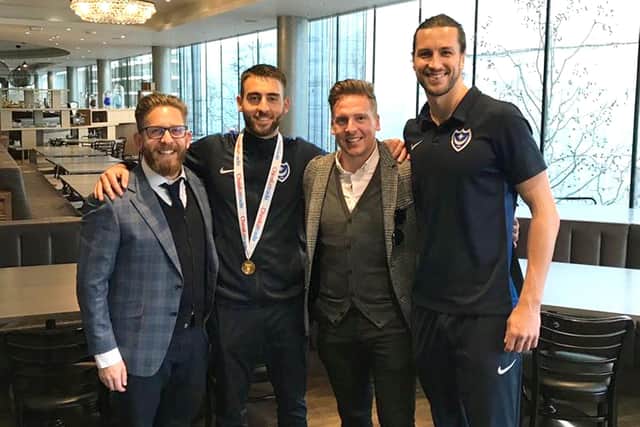 Brian Howard (centre right) is pictured with Ben Close, Christian Burgess and his business partner Phil Korklin (far left) following Pompey's Checkatrade Trophy final victory in March 2019
