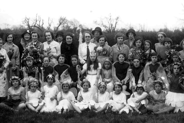 May Queen 1931Sent in by Mrs Joyce Clancy nee Brooks of Havant we see the May Queen at Bedhampton  School, Bedhampton near Havant. Joyce is third from the right front row, Taken sometime in the early thirties the May Queen in the centre with long hair is Doris Gregory and her maid is Elsie Allan. The school is now the Bedhampton Arts Centre.