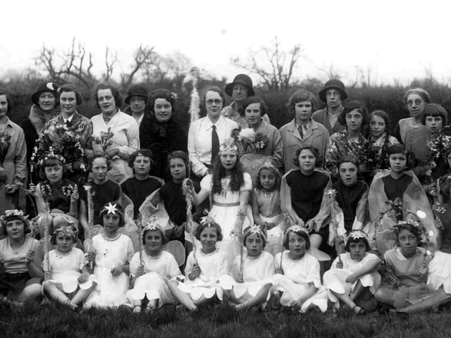 May Queen 1931Sent in by Mrs Joyce Clancy nee Brooks of Havant we see the May Queen at Bedhampton  School, Bedhampton near Havant. Joyce is third from the right front row, Taken sometime in the early thirties the May Queen in the centre with long hair is Doris Gregory and her maid is Elsie Allan. The school is now the Bedhampton Arts Centre.
