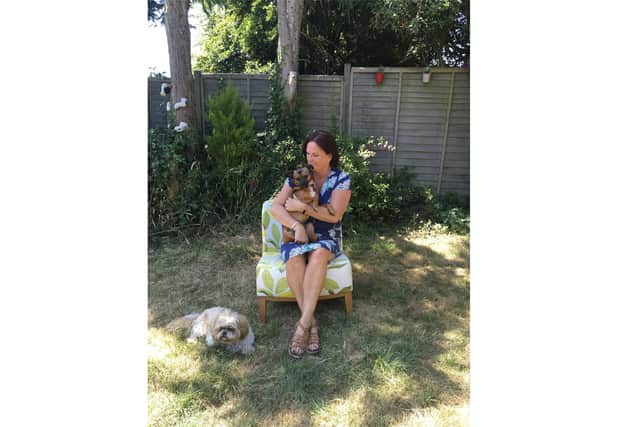 Mary Burgess, founder of Pet Connect UK, has set up the Pet Connect Pet Food Bank to help owners who are struggling to buy food for their pets. Pictured: Mary with her dogs Romana and Gracie Lou