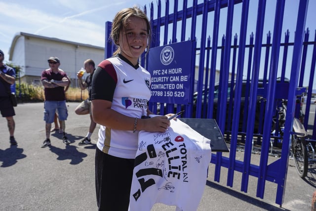 This young fan was collecting signatures before the game outside Fratton Park