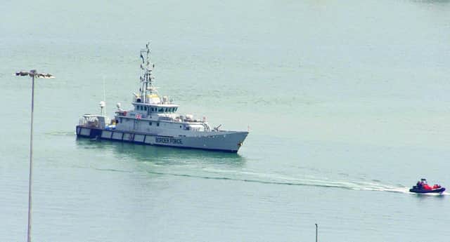 Border Force cutter Seeker in the harbour at port of Dover as more migrants are brought ashore. Picture: Michael Dummond/PA Wire